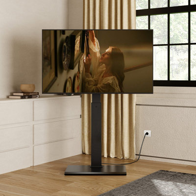 FITUEYES Swivel Floor TV Stand with Power Outlet for 27-65 inch TVs with Iron Base , Modern TV Mount with Height Adjustable and Holds up to 88LBS by Fitueyes
