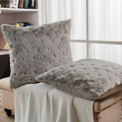 Housse de coussin jacquard en fausse fourrure
