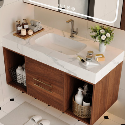 Meuble-lavabo suspendu de 39,4 pouces, lavabo en céramique, tiroirs à fermeture douce, comptoir en pierre frittée, grand espace de rangement, design moderne avec décoration dorée, meuble-lavabo de 2 pouces en pierre blanche.