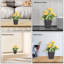 Plante artificielle en pot à fleurs jaunes