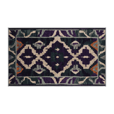 Tapis mauve lavable à la machine