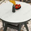 Ensemble de table ronde 5 pièces avec une table de salle à manger en faux marbre et quatre chaises en similicuir