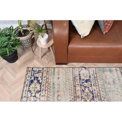 Tapis turc bleu et beige fait à la main à motif floral pour un décor bohémien sur votre plancher