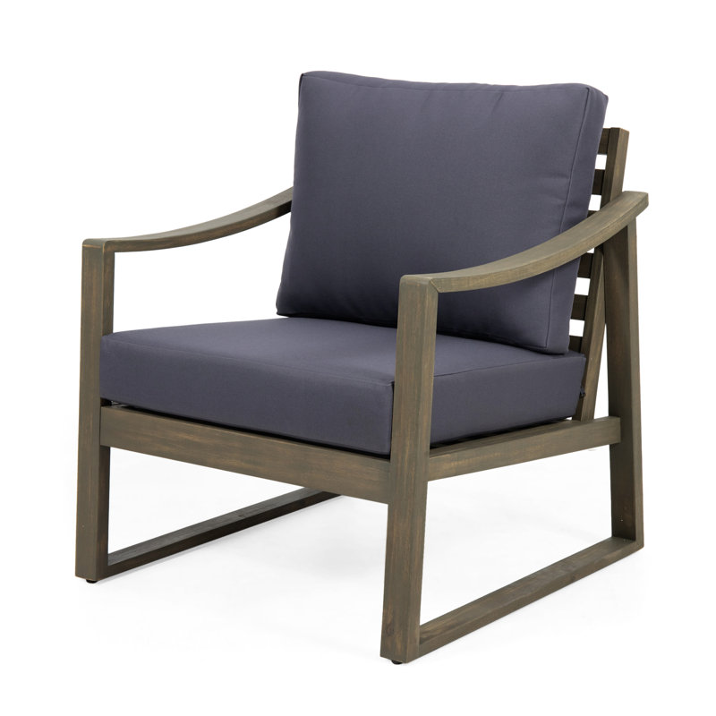 Wood Club Chair For Outdoor Spaces With Dark Grey Water- Foot Cushions And Classic Slat Look
