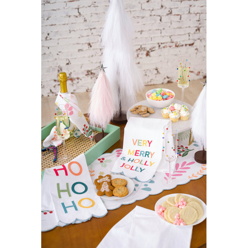Serviette brodée avec des phrases de Joyeux Noël