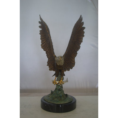Jenkinson Eagle Catching His Prey from Water Bronze Statue -  Size: 14"L x 13"W x 26"H.