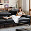 Canapé modulaire noir en cuir véritable-129104621