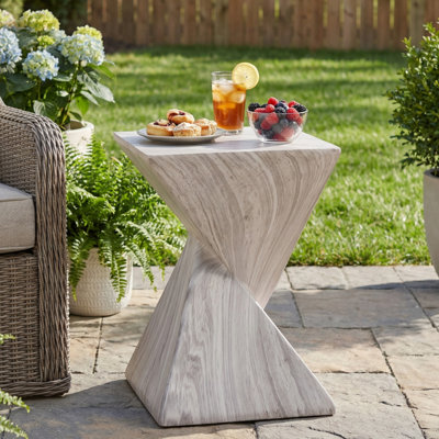 Andree 18.5"H Outdoor Magnesium Oxide Side Table with Sculptural Twist Design
