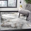 Tapis gris et or à motif abstrait Swindle-1766689040