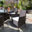 Dubose 4 - Person Wicker Patio Dining Set with Round Table , Cushions Included-37961049-128712914