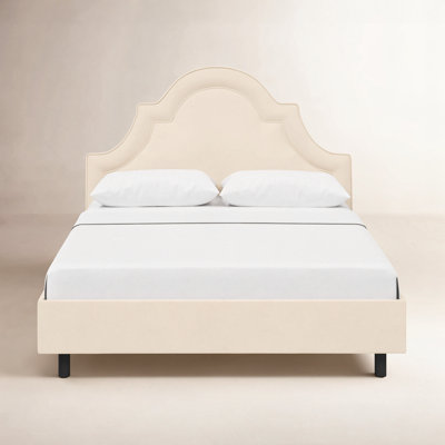 Knipe Upholstered Unfinished Scalloped Bed