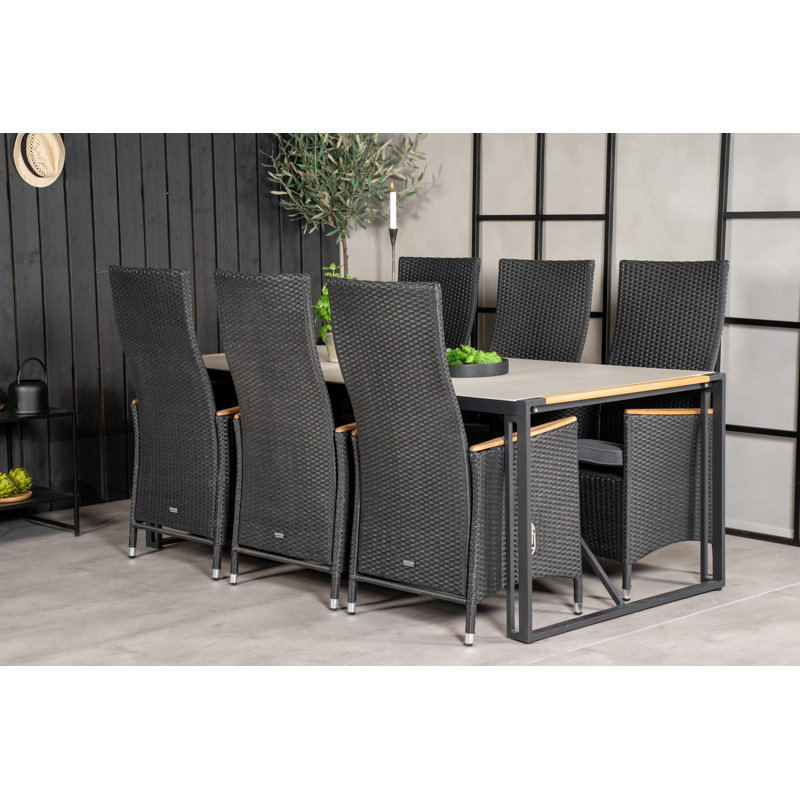 Shantelle 6 - Person Patio Dining Set Rectangular Table with Cushions Included