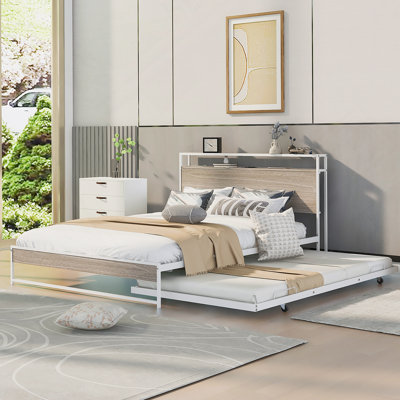 Structure de lit plateforme en métal avec lit gigogne, ports USB, support à lattes et tablettes de tête de lit pour une configuration de chambre confortable et fonctionnelle