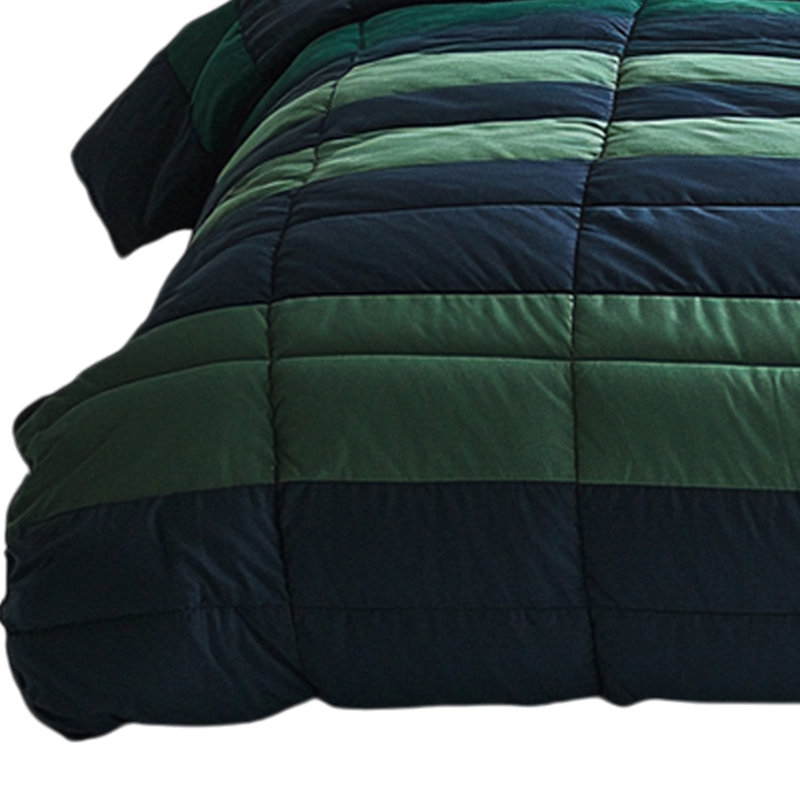 Couette moderne à patchwork géométrique