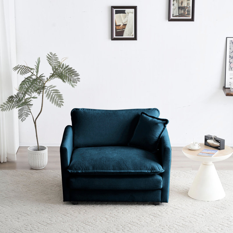 Fauteuil en chenille bleu pour le salon