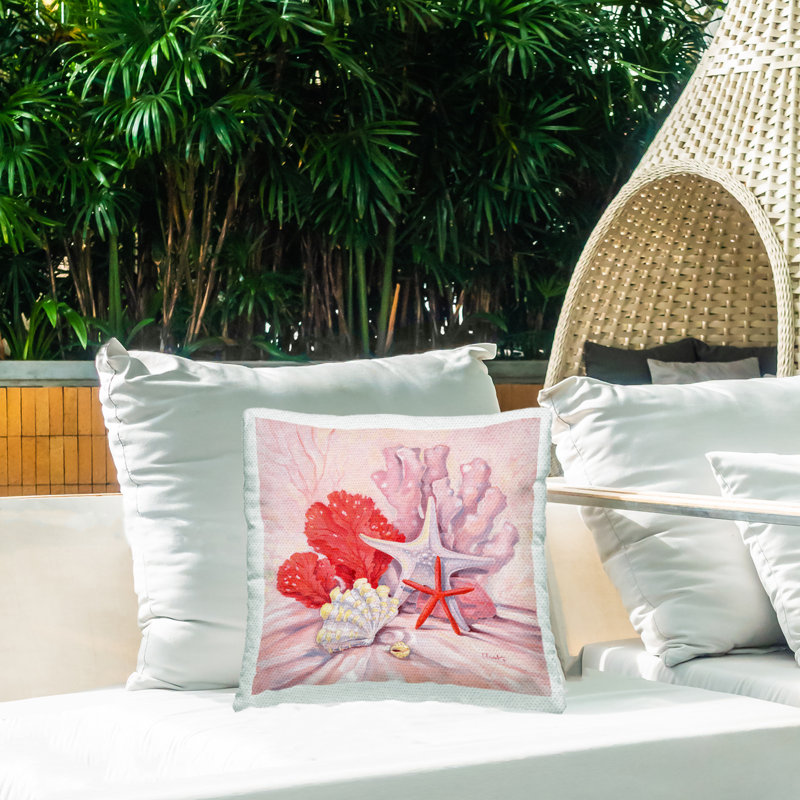 Coussin d'extérieur à imprimé d'étoiles de mer roses et rouges par Paul Brent