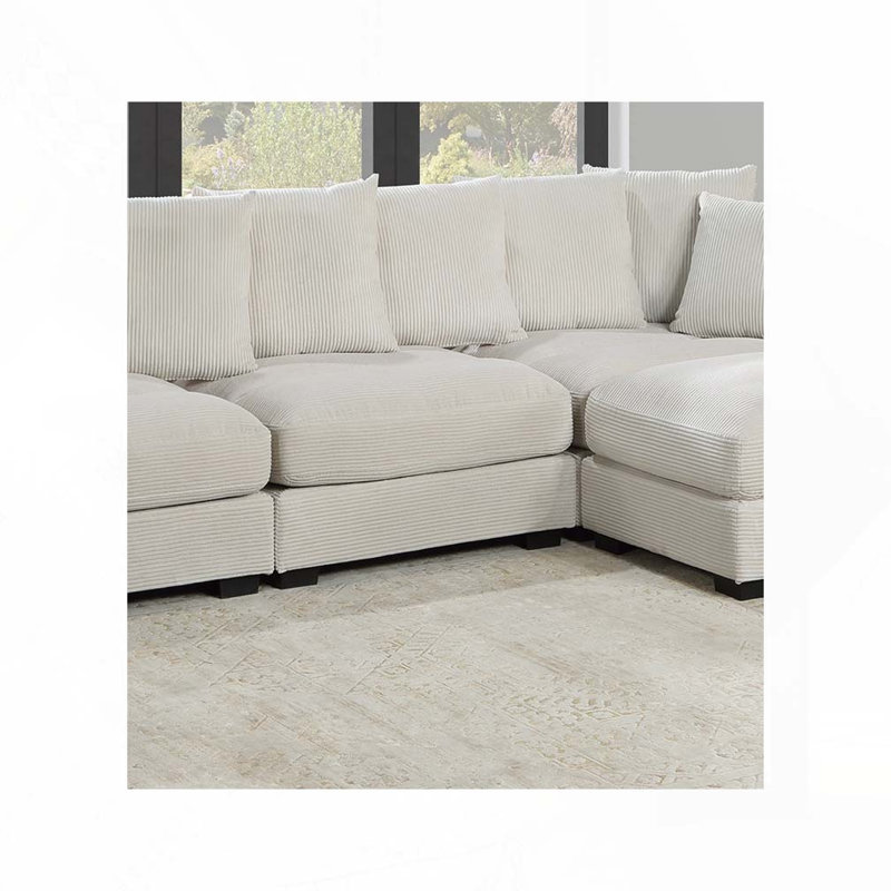 Fauteuil en velours côtelé
