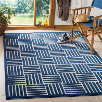 Tapis à carreaux Zaniyah Performance