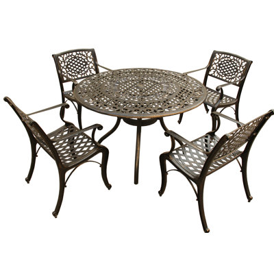 Casperson 4 - Person Patio Dining Set with Round Table