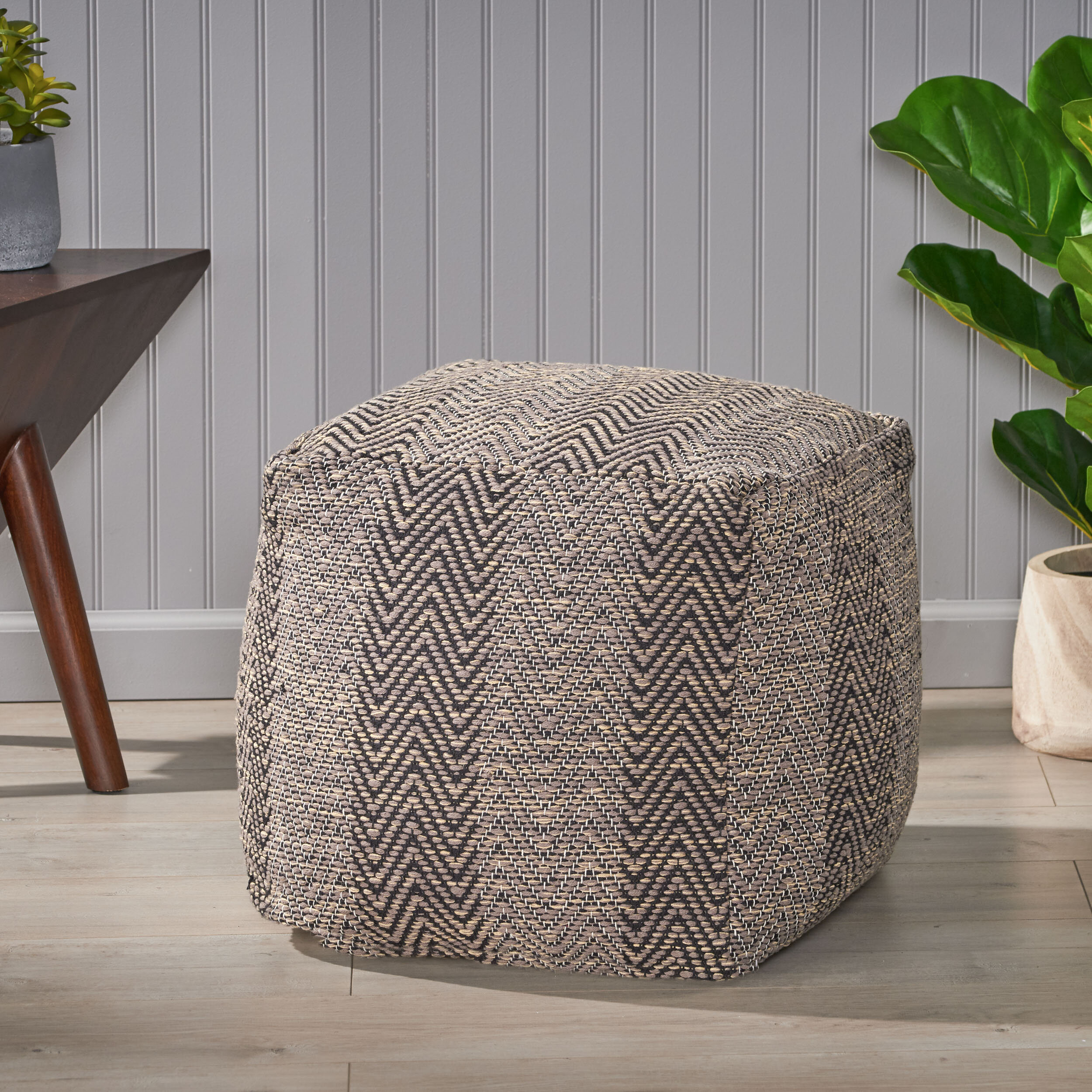 https://assets.wfcdn.com/im/38545528/compr-r85/1251/125165136/miriam-upholstered-pouf.jpg