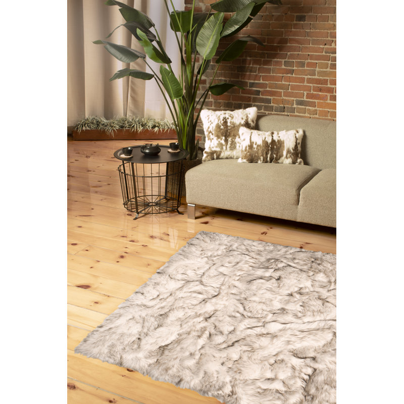 Clarkin Faux Sheepskin Fur Chocolate Area Rug