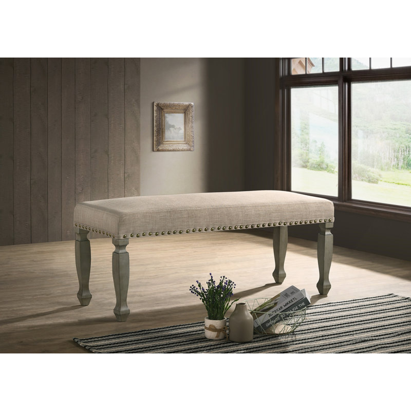 Banc rembourré à têtes de clou