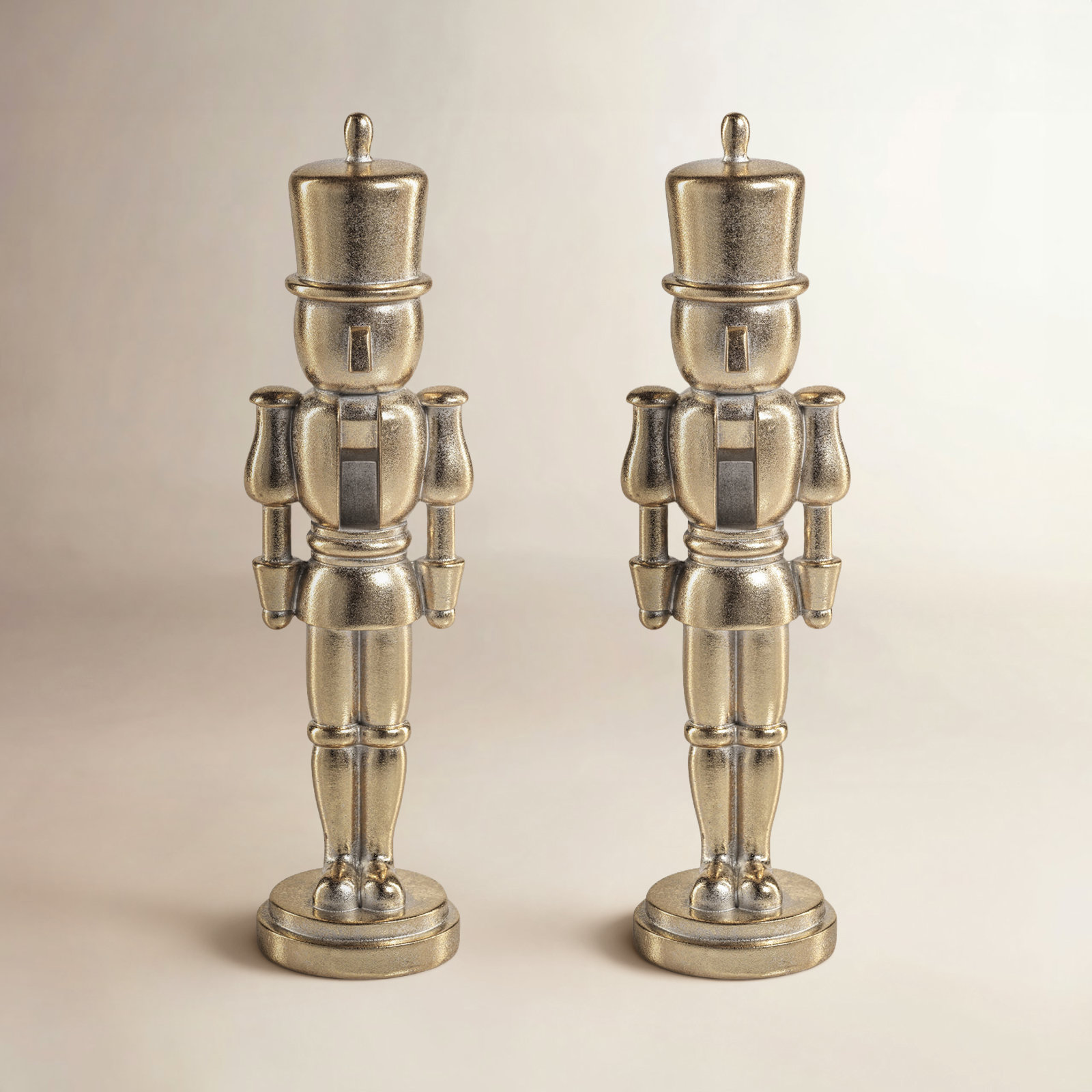 2-Piece Metallic Nutcracker Figurine Set, 10" H x 2.5" W x 2.5" D, Gold