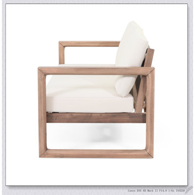 Ensemble de causeuse et de table basse d'extérieur en bois d'acacia avec coussins résistants aux intempéries, parfait pour la détente sur le patio