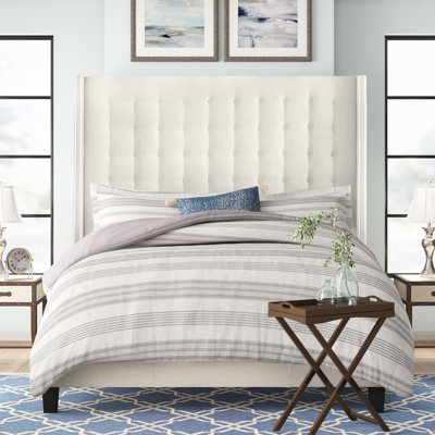 Kaster Upholstered Wingback Bed