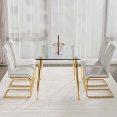 Table and chair set.Rectangular Dining Table with Tempered Glass Tabletop and Gold plating Metal Legs.Paired with 4  Chairs With Gold Metal Legs. Modern Light Luxury.