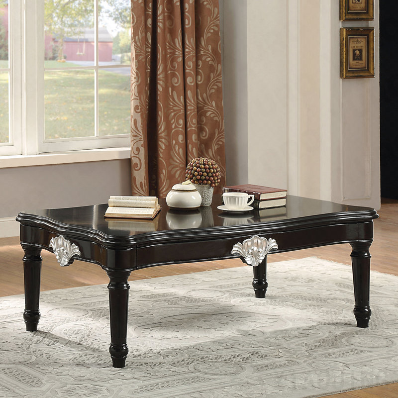 Table basse noire avec pieds tournés