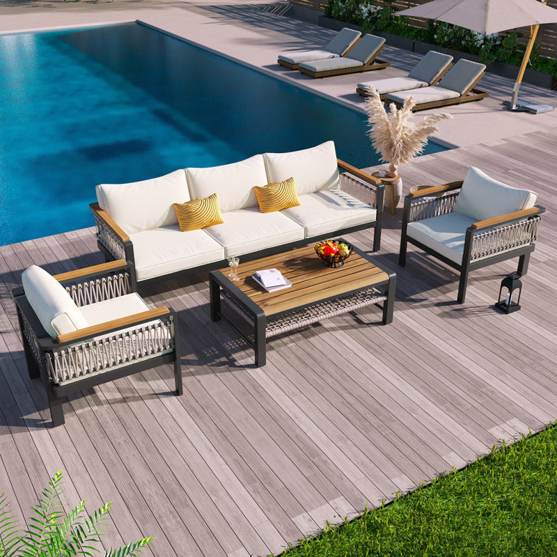 Ensemble de canapé modulaire d'extérieur 4 pièces avec coussins et table basse, parfait pour les rassemblements de patio, de jardin ou de balcon