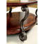Table basse de salon classique avec finition cerisier brun et ornements en bois massif avec rangement ouvert