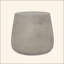 Charmante table d'appoint en béton au design polyvalent pour des espaces élégants