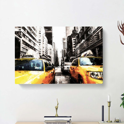 Two Yellow Taxi Cabs in New York in Abstract - Wrapped Canvas