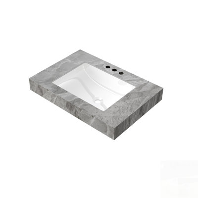 Plan de travail en pierre frittée haut de gamme avec lavabo en céramique encastrée, offrant une résistance élevée à la chaleur, aux égratignures et à l'eau pour une installation moderne dans une cuisine.
