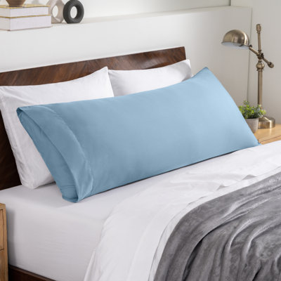Fermeture de l'enveloppe du coussin en microfibre