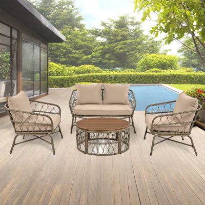 Boho-inspired 4-person Outdoor Seating Group With Removable Cushions And Wood Tabletop by Ebern Designs