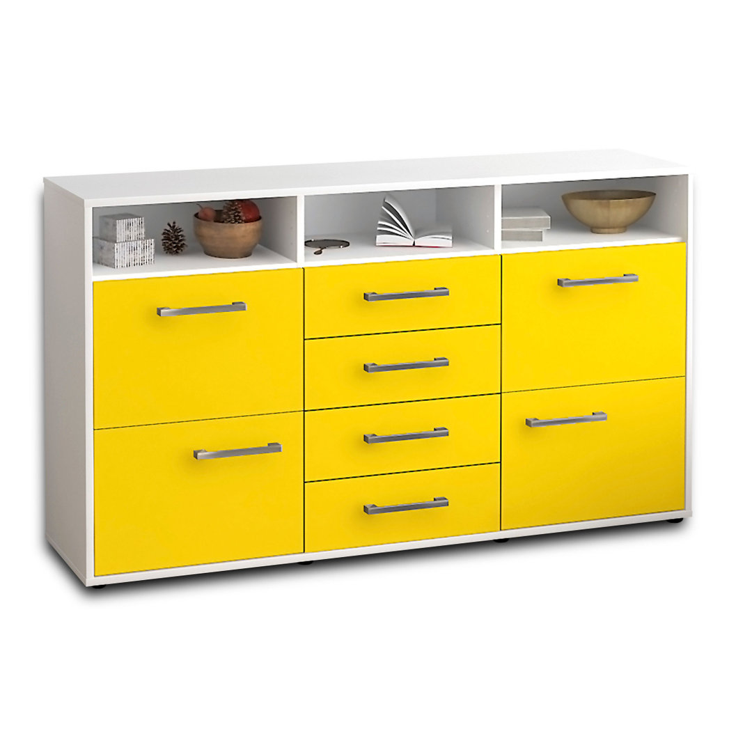 Das Sideboard Donabella hat einen weißen Korpus und eine orange Hochglanzfront. Es misst 136 cm x 79 cm x 35 cm und verf...