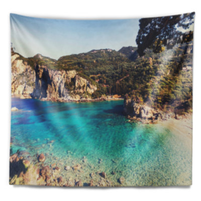 Tapisserie Rocky Beach avec eau turquoise