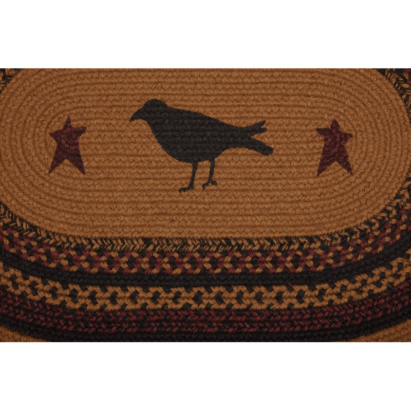 Oval Braided Jute Rug with Crow Design in Black and Mustard