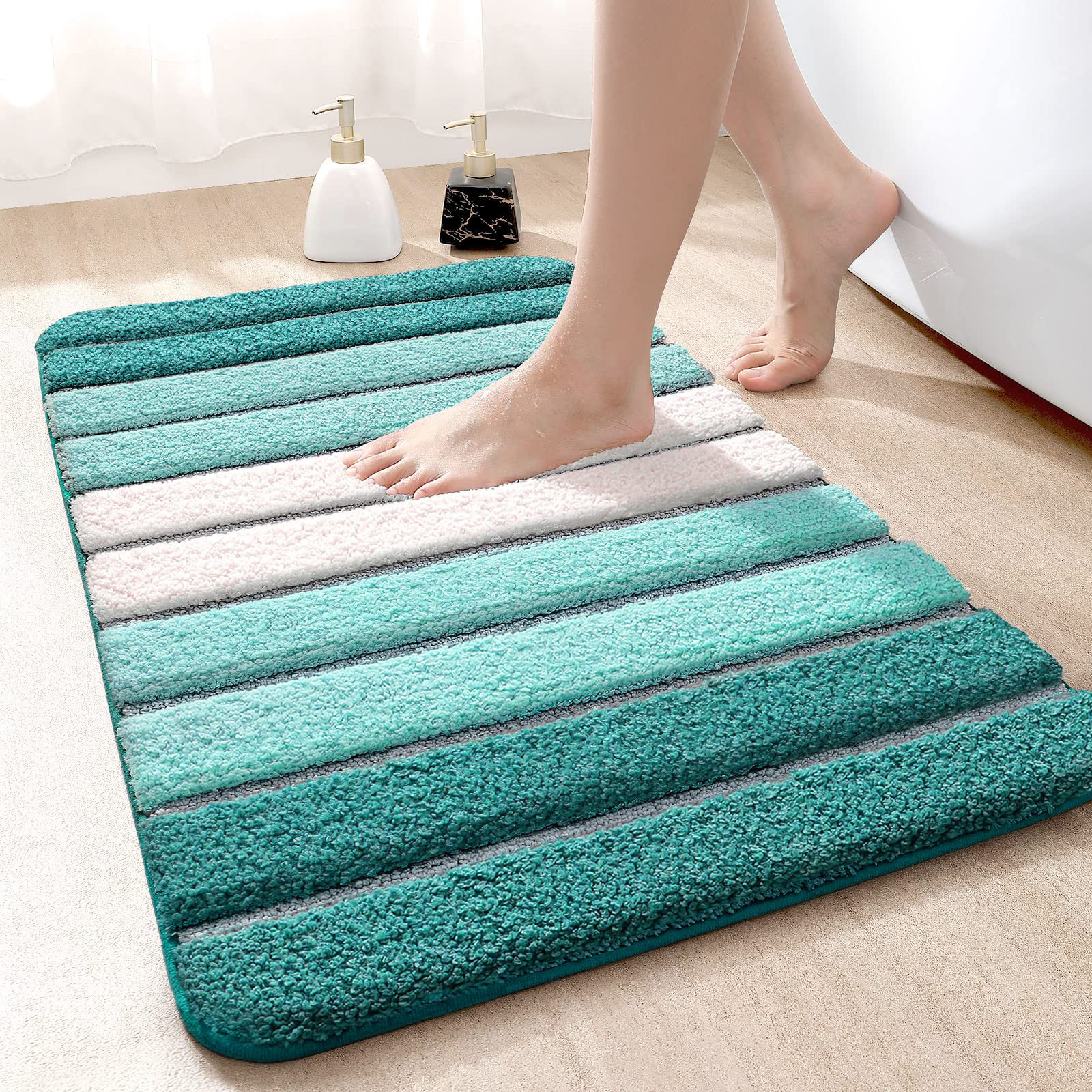 https://assets.wfcdn.com/im/38626535/compr-r85/2554/255408045/helsa-striped-bath-rug.jpg