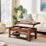 Table basse à plateau relevable Arrik avec compartiment de rangement dissimulé et tablettes ouvertes