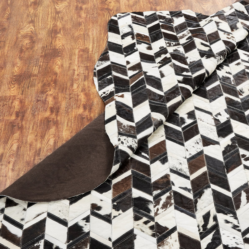 Brooksie Cowhide Geometric Area Rug in Brown/White, Novelty 2' x 3'