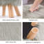 Tabouret de repose-pieds en fourrure artificielle Adelfina