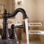 Robinet pour salle de bain à 2 poignées avec ensemble de bonde centrales-87982045
