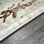 Tapis de luxe Shifra beige et gris avec motif abstrait bronze-750777970