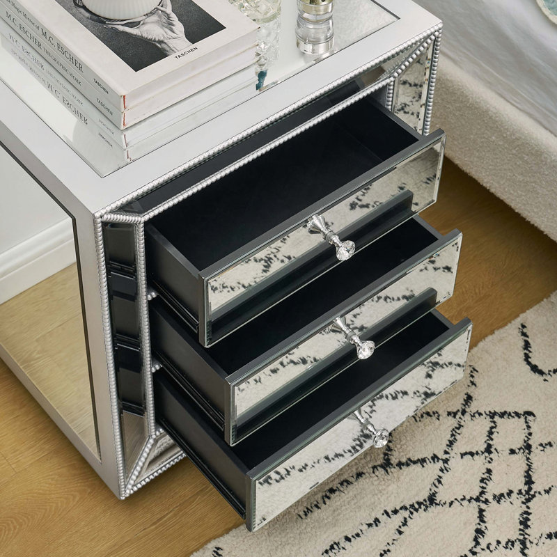 Armoire à finition miroir à trois tiroirs