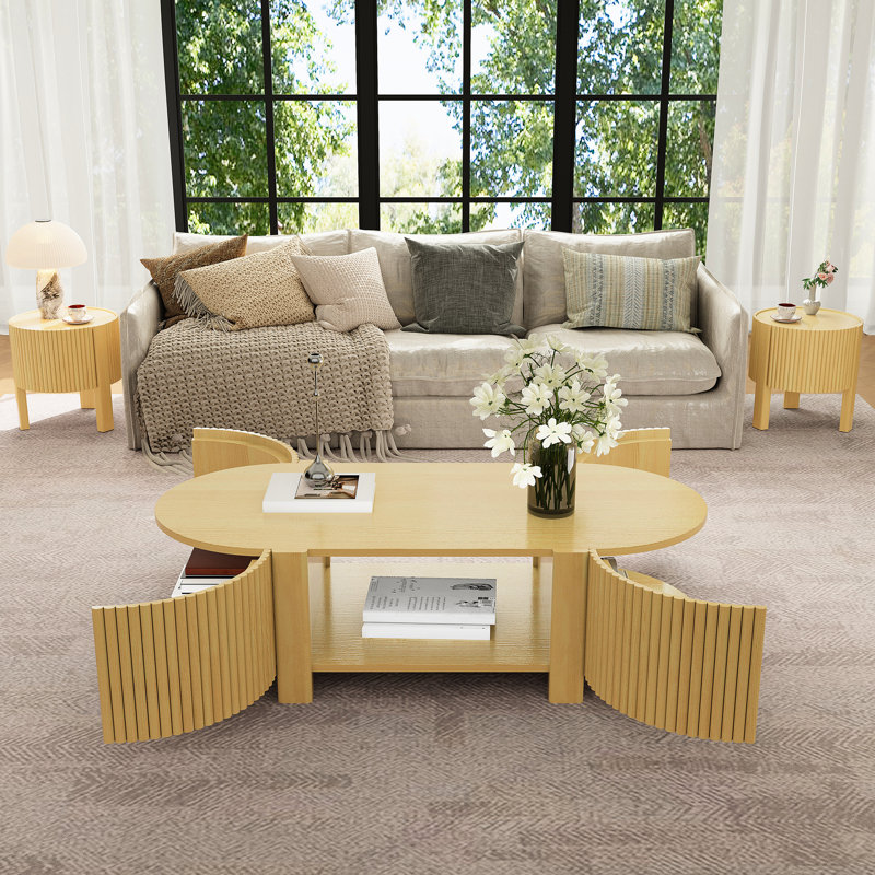 Table basse ovale cannelée avec 1 tablette et 2 portes de rangement ouvertes