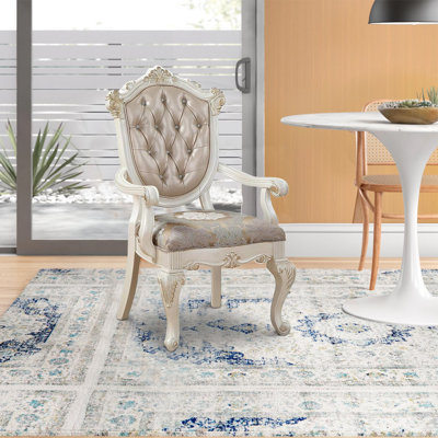 Chaise avec accoudoirs capitonnée Bayleen